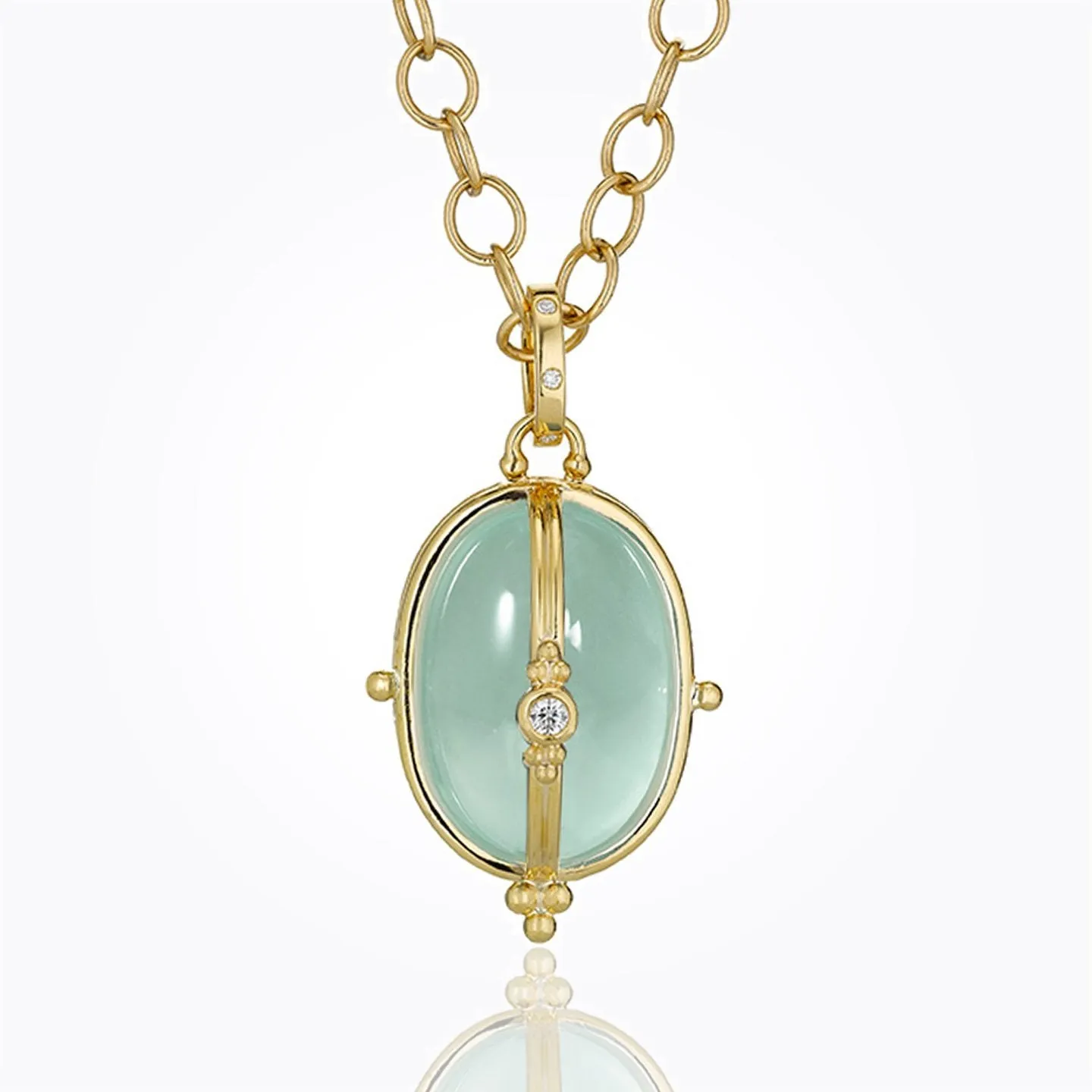 18K Classic Cabochon Locket with aquamarine and diamond