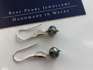 Earrings: Single green peacock pearl drop earrings on longer hook - classic
