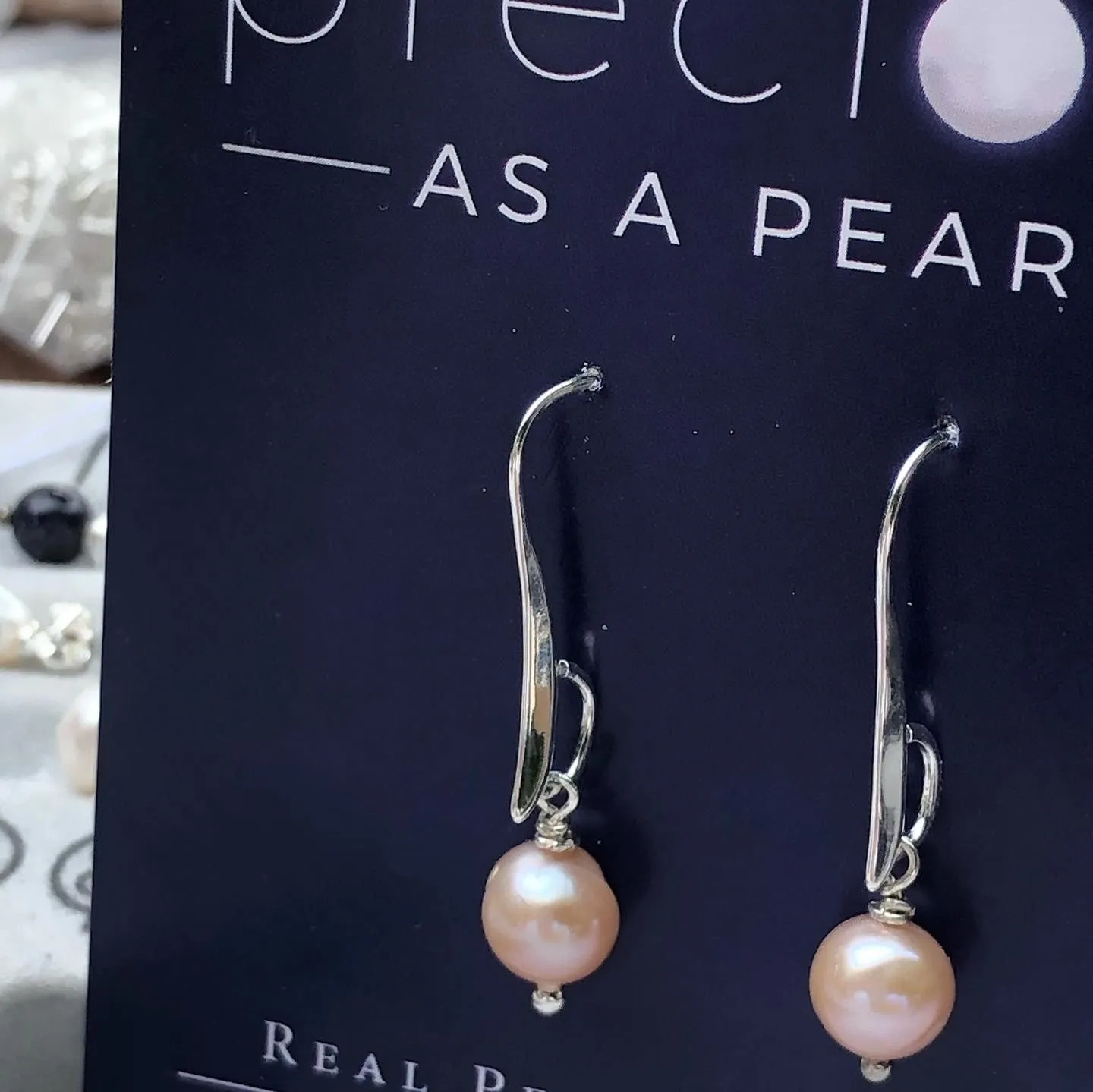 Earrings: Single pearl drop earrings on longer hook classic