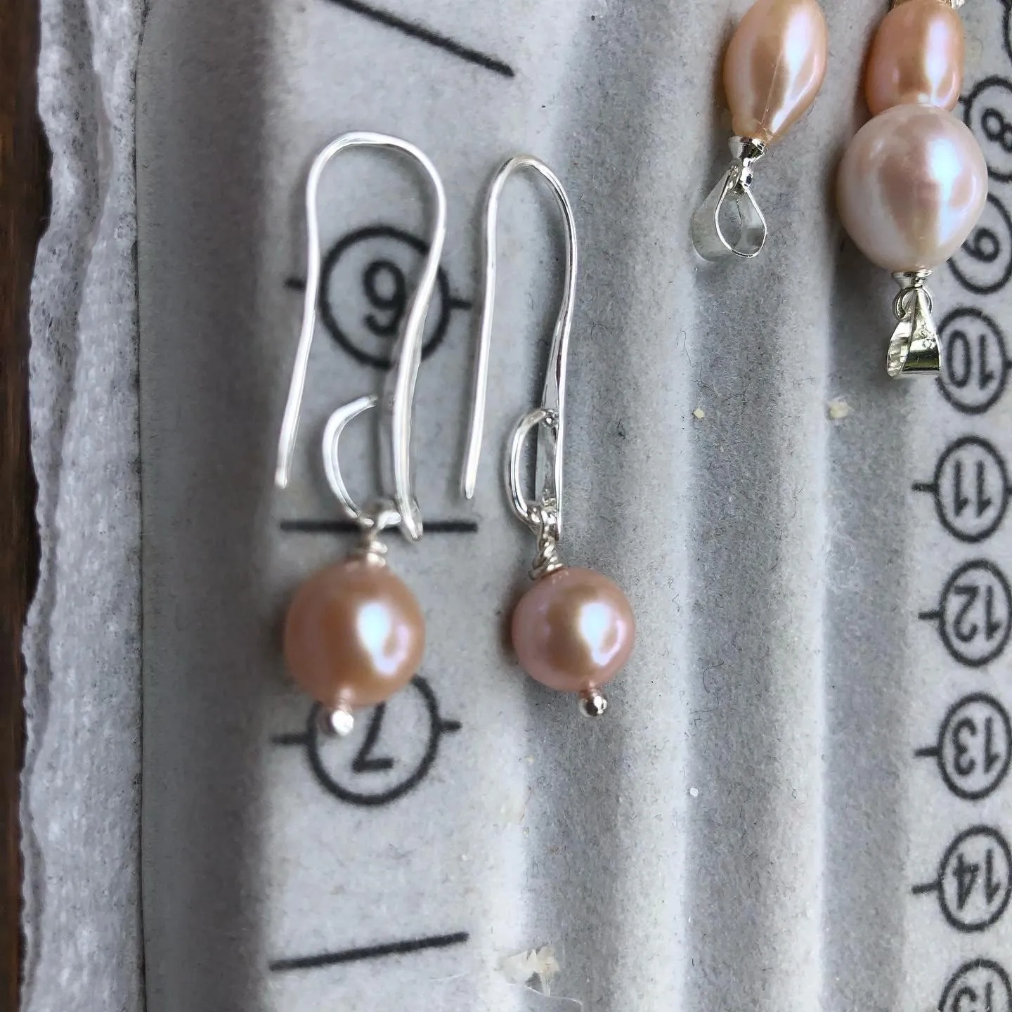 Earrings: Single pearl drop earrings on longer hook classic