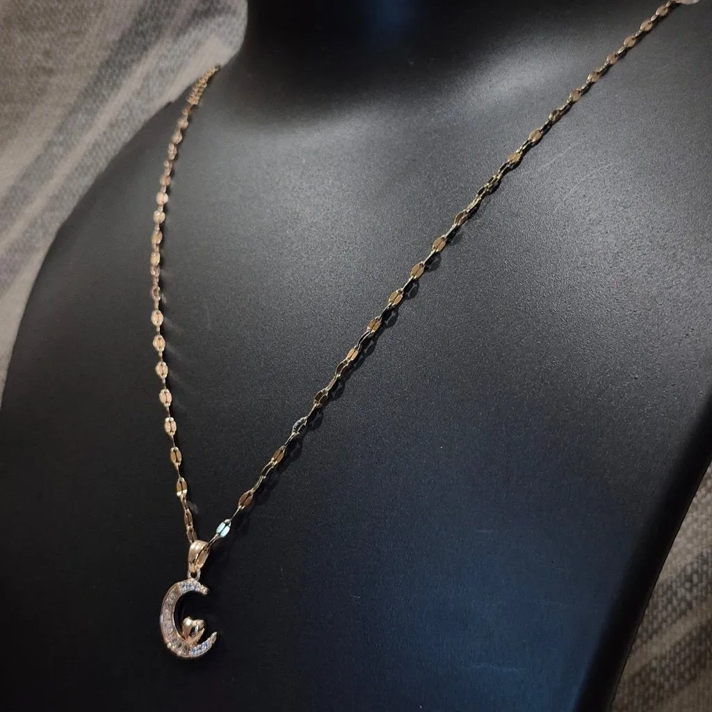 Half moon diamond pendant and braided chain